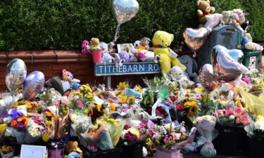 Floral tributes are left for the victims of a deadly knife attack in Southport