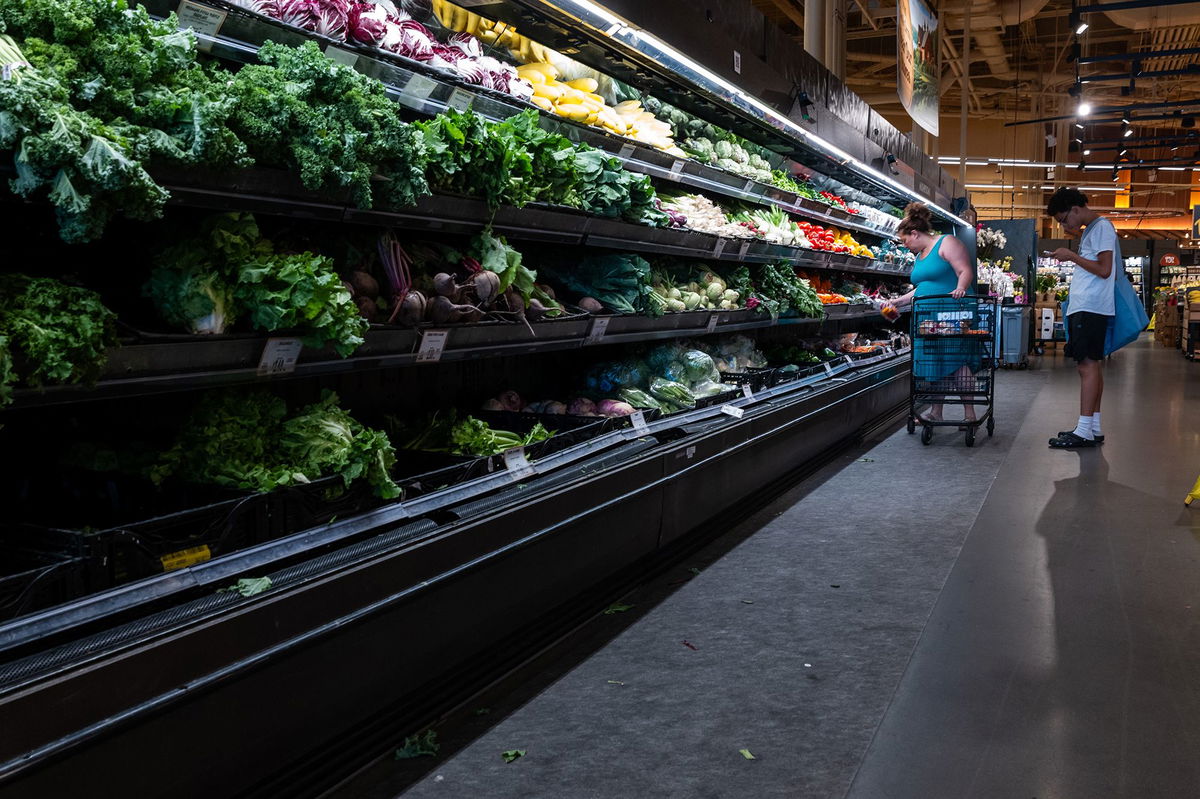 <i>Spencer Platt/Getty Images via CNN Newsource</i><br/>People shop at a grocery store on July 11