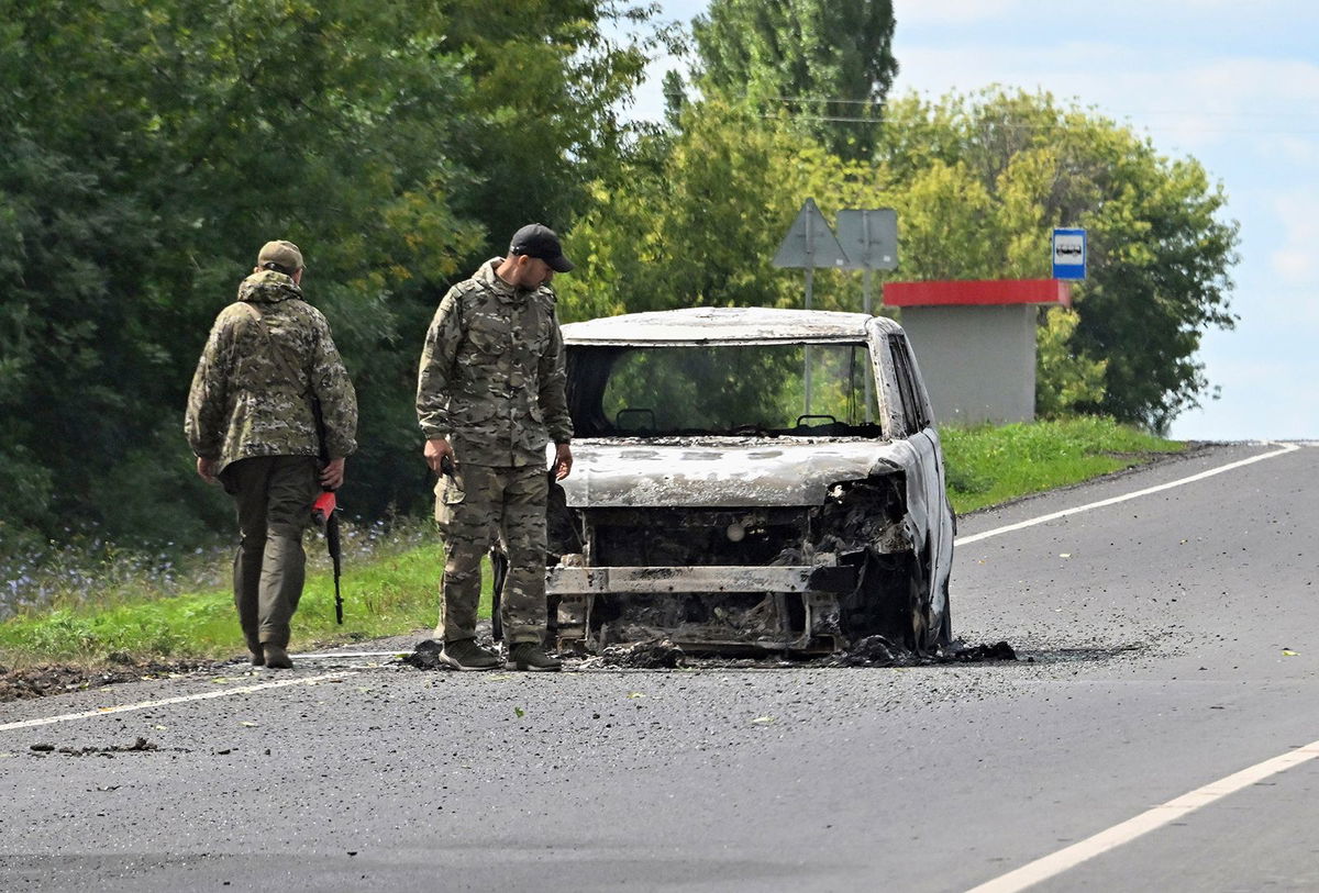 <i>Anatoliy Zhdanov/SIPAPRE/AP via CNN Newsource</i><br/>A burnt-out car is seen on the highway between Kursk and Sudzha on August 9.