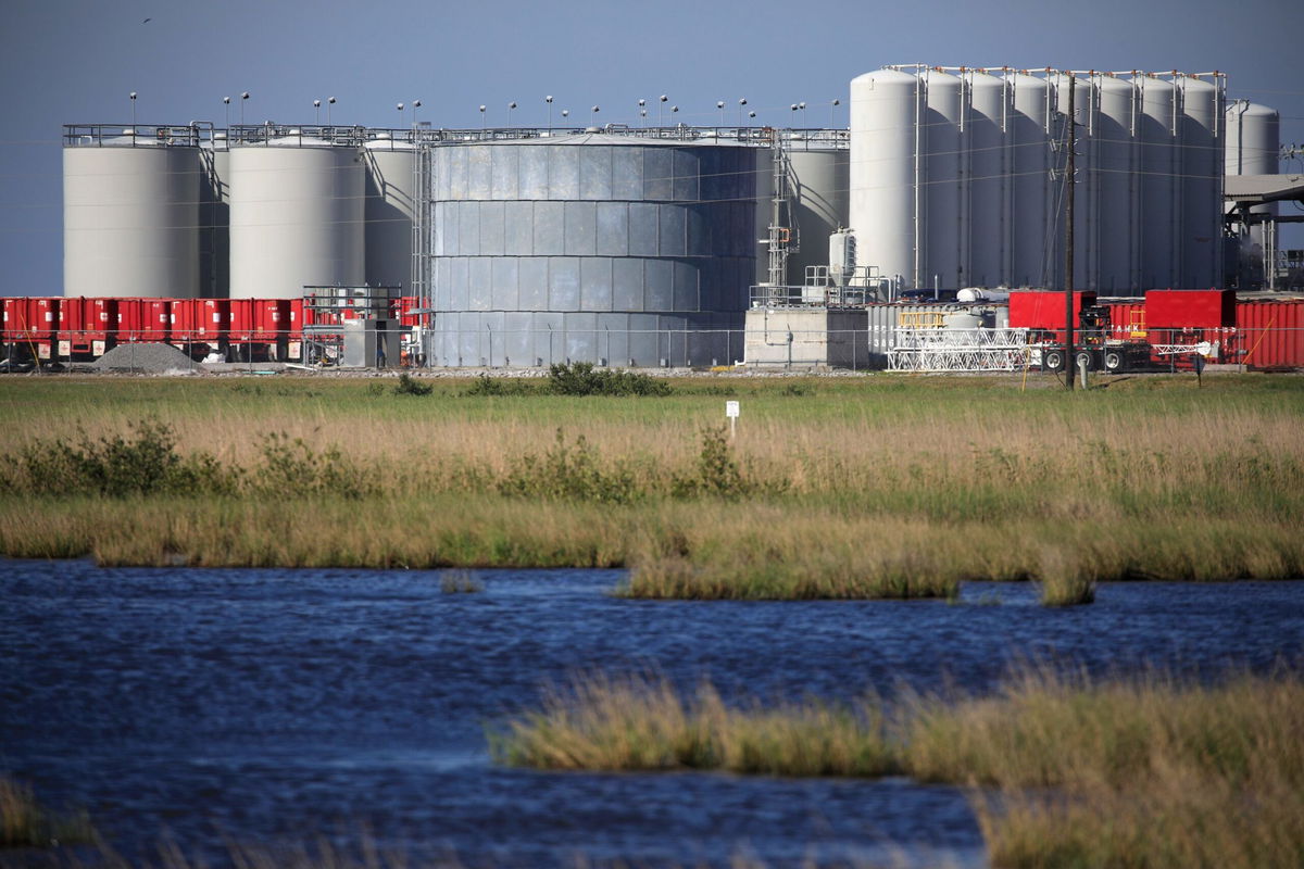 <i>Luke Sharrett/Bloomberg/Getty Images via CNN Newsource</i><br/>Fuel storage tanks at a Halliburton Co. facility in Port Fourchon