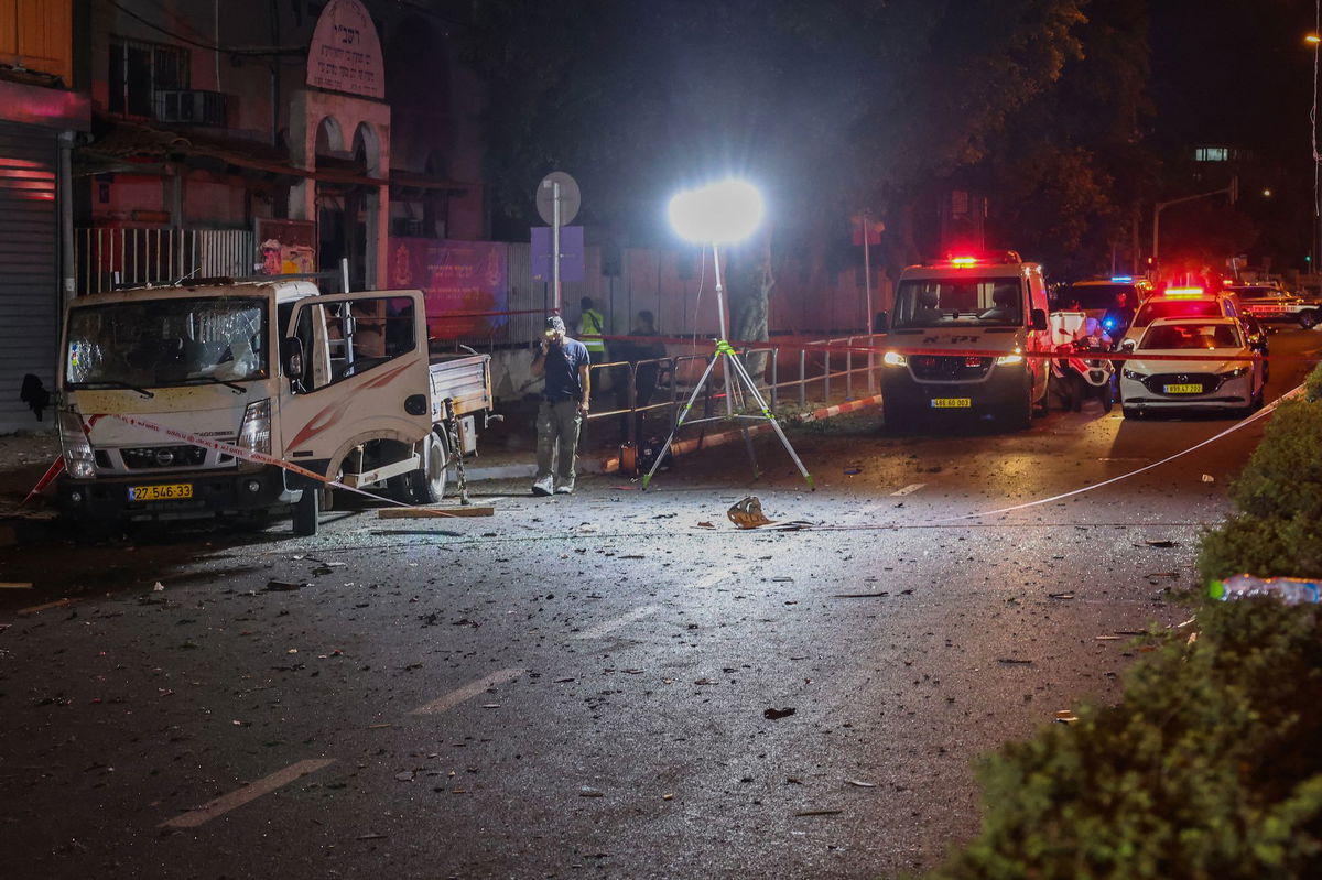 <i>Jack Guez/AFP/Getty Images via CNN Newsource</i><br/>Israeli security and emergency personnel cordon off the site of an explosion in Tel Aviv on August 18.