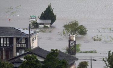 Farmland is submerged due to floods caused by heavy rains from Typhoon Shanshan in Oita prefecture