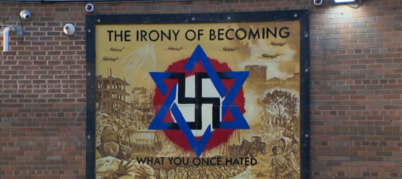 <i>WISN via CNN Newsource</i><br/>The mural that replaced the mural of Breonna Taylor sitting at Holton and Locust streets shows the Star of David intertwined with a swastika alongside the message