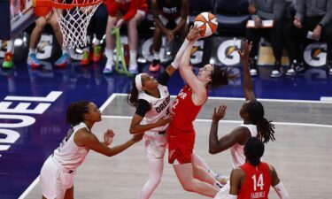 The Fever's NaLyssa Smith scores a layup during the matchup.