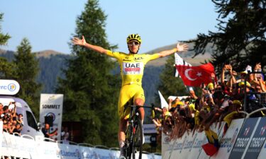 Tadej Pogačar celebrates winning stage 20 of this year's Tour de France.