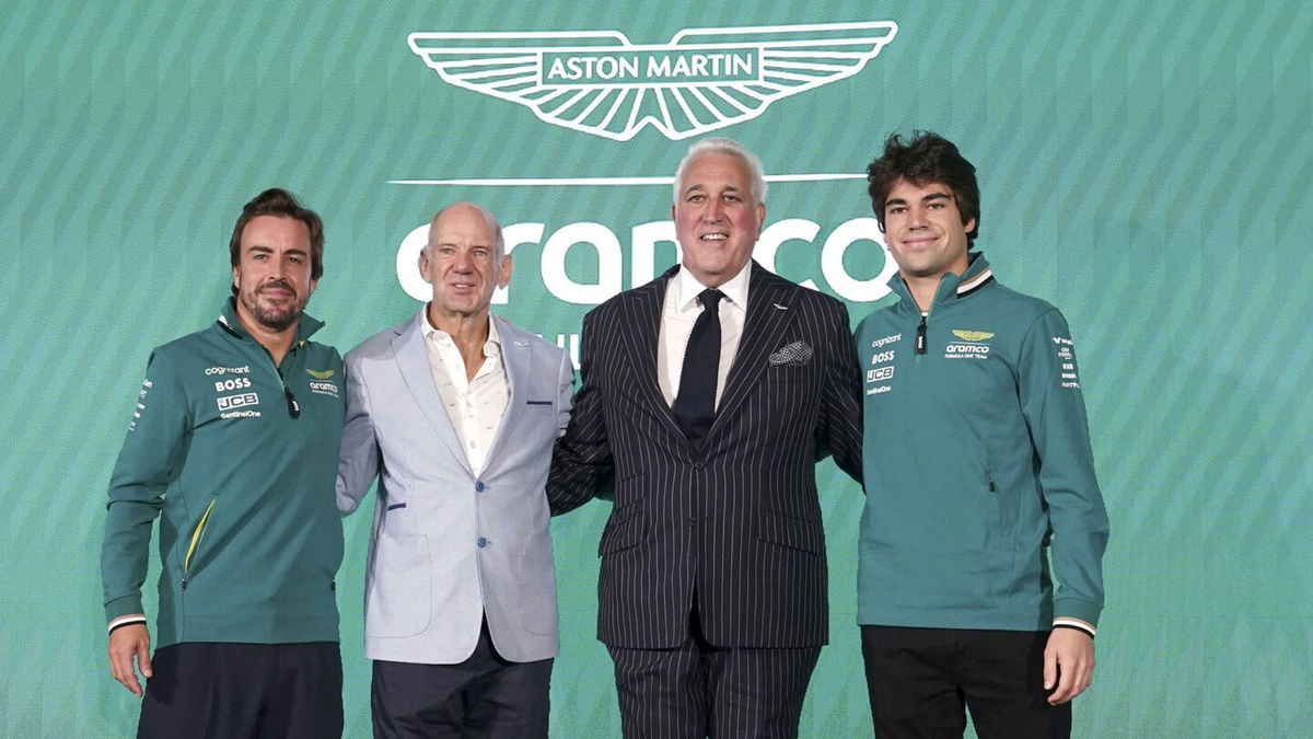 <i>Bradley Collyer/PA/AP via CNN Newsource</i><br/>Aston Martin drivers Fernando Alonso (left) and Lance Stroll (right) with Adrian Newey (center left)