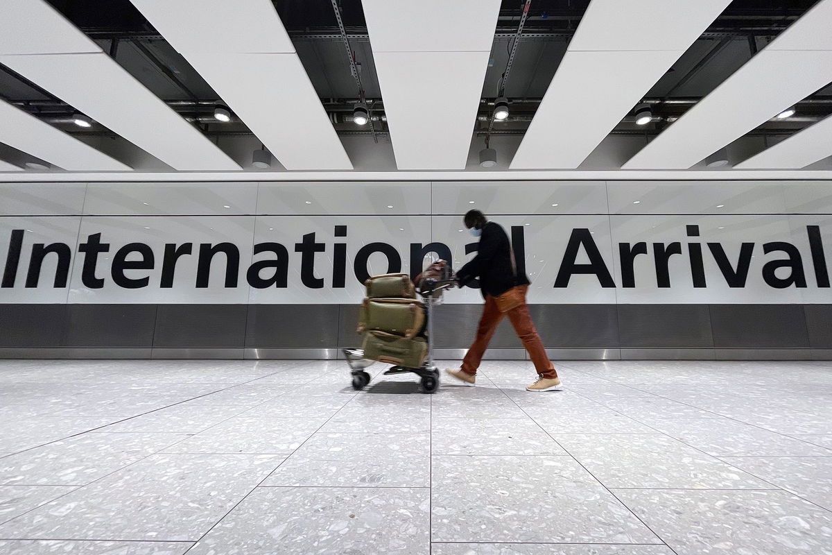 <i>Leon Neal/Getty Images via CNN Newsource</i><br />International passengers arriving at London's Heathrow Airport in 2021.