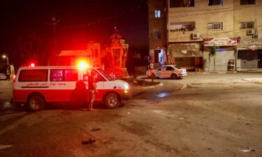 An ambulance is seen at the site of Israeli strikes where Palestinians were killed