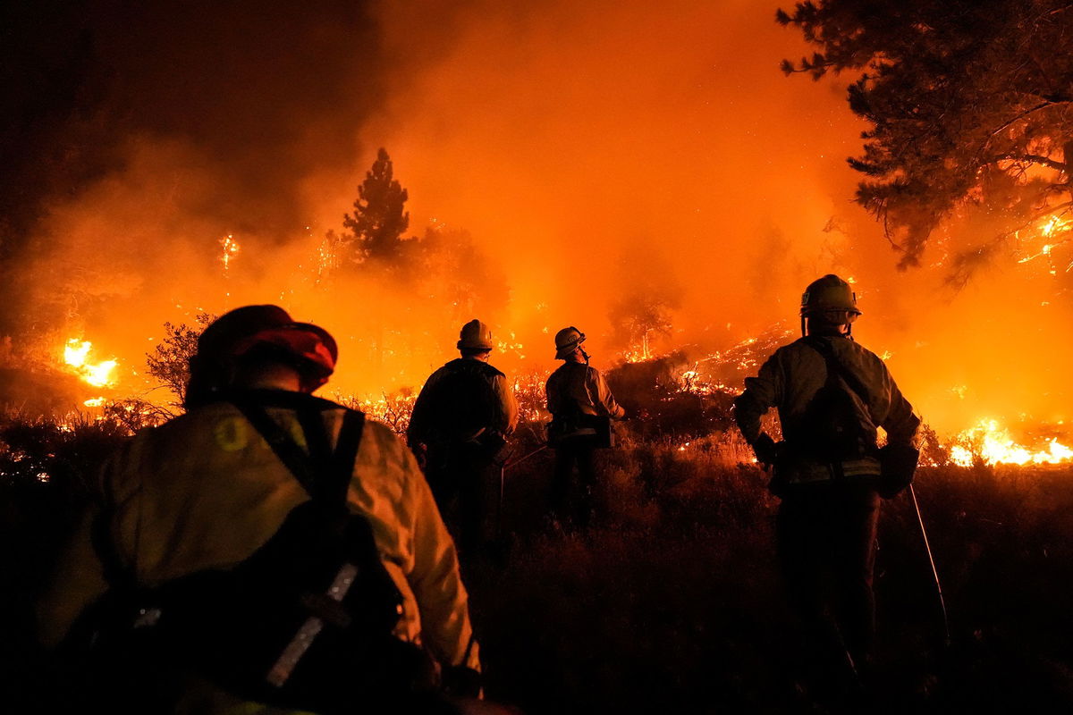 <i>Jae C. Hong/AP via CNN Newsource</i><br/>The Bridge Fire spread rapidly in Southern California September 10.