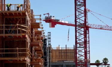 Construction continues on a mixed-use apartment complex in Los Angeles in August.