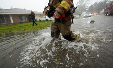 Morgan City firefighters respond to a home fire during Hurricane Francine in Morgan City