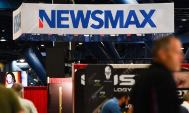 A Newsmax booth broadcasts at the National Rifle Association annual convention in Houston on May 29