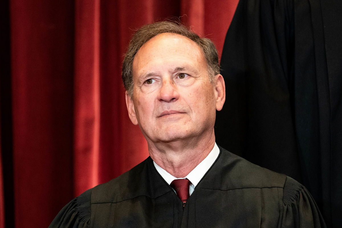 <i>Erin Schaff/Pool/Getty Images via CNN Newsource</i><br/>Associate Justice Samuel Alito sits during a group photo of the Justices at the Supreme Court in Washington