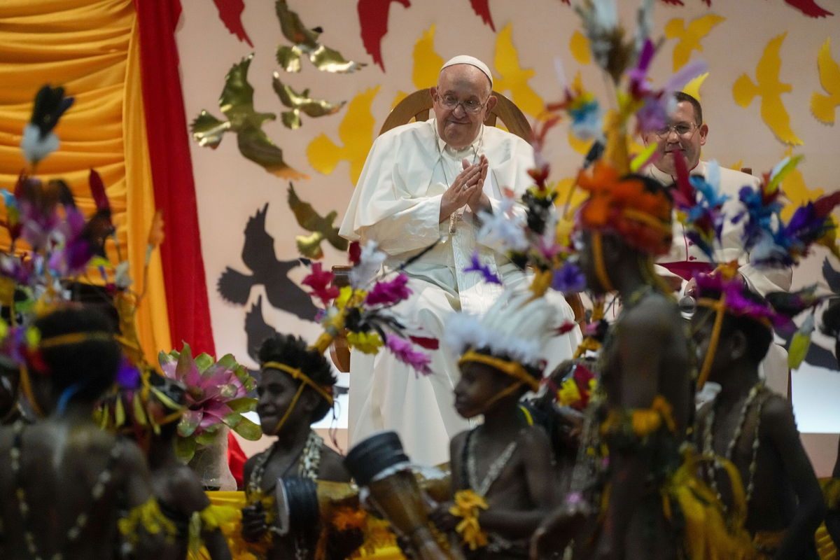 <i>Gregorio Borgia/AP via CNN Newsource</i><br/>Pope Francis arrives at the Caritas Technical Secondary School in Port Moresby on September 7.