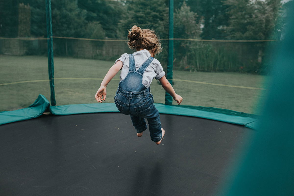 <i>Catherine Falls Commercial/Moment RF/Getty Images via CNN Newsource</i><br/>Pediatricians strongly discourage home use of trampolines but recommend they should be restricted to a single jumper on the mat at one time if kids do play on them.