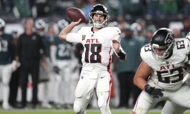 Atlanta Falcons quarterback Kirk Cousins throws a touchdown pass against the Philadelphia Eagles.