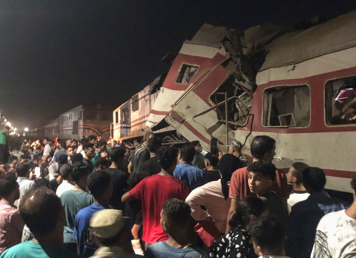 <i>AP via CNN Newsource</i><br/>People surround two passenger trains which collided in the Egyptian city of Zagazig on September 14.