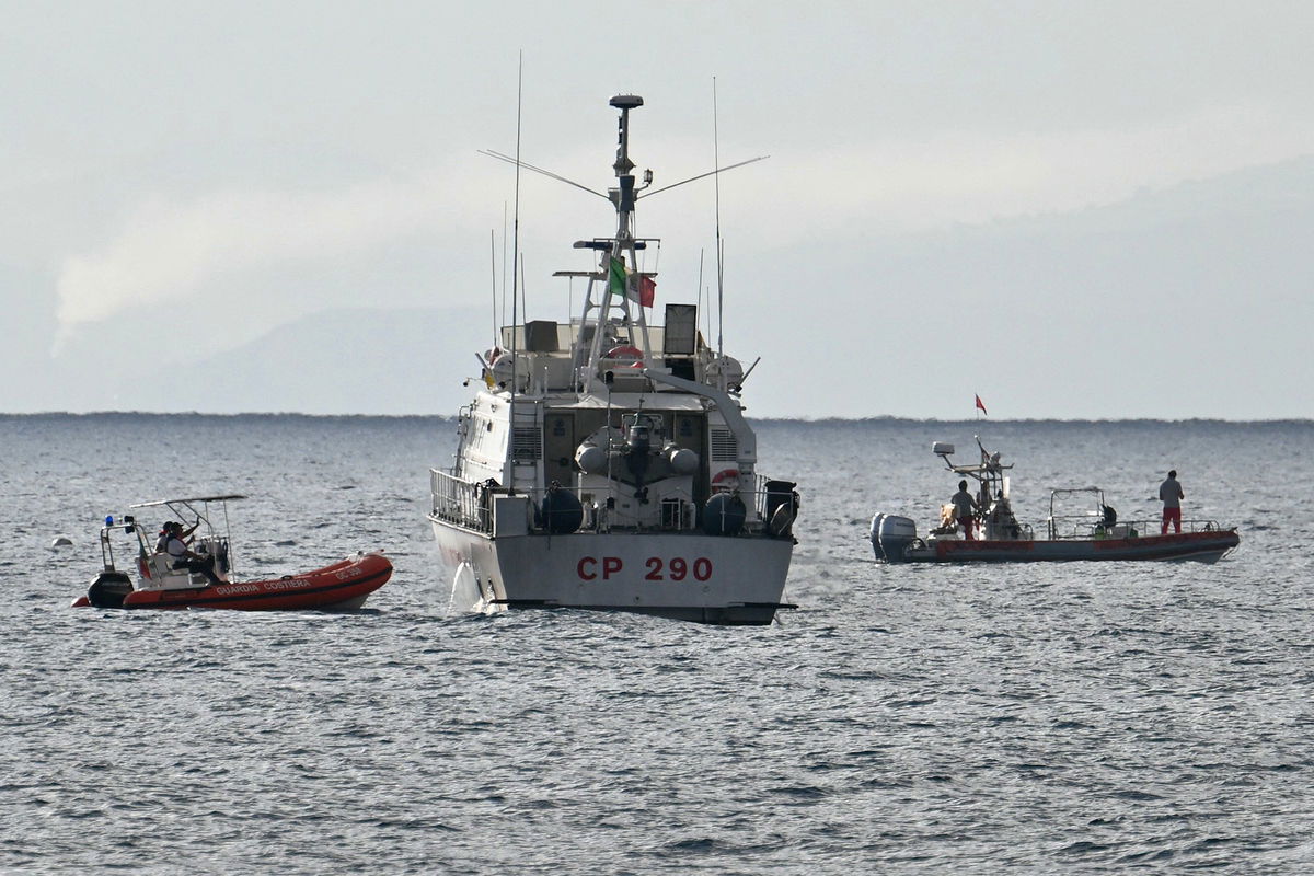 <i>Alberto Pizzoli/AFP/Getty Images/File via CNN Newsource</i><br/>Rescue ships operate off Porticello near Palermo