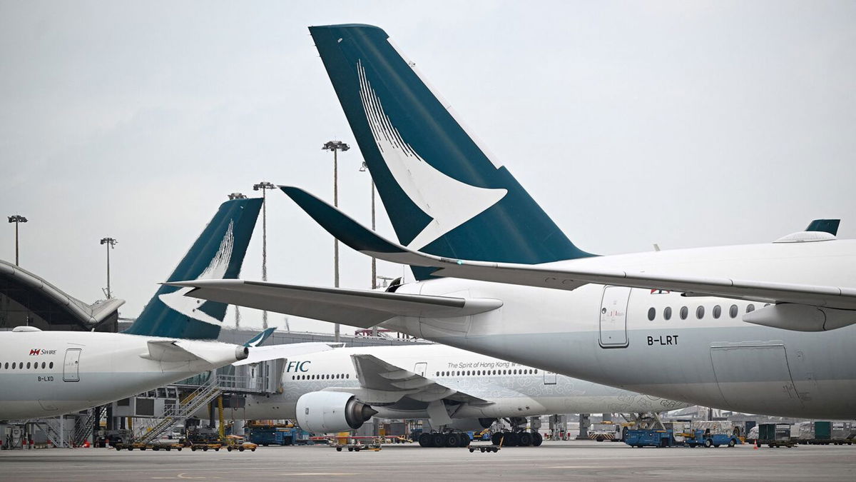 <i>Peter Parks/AFP/Getty Images via CNN Newsource</i><br/>Hong Kong-based airline Cathay Pacific has banned two passengers from its flights after an argument over seat-reclining etiquette descended into xenophobic insults.