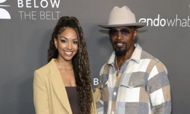 Jamie Foxx looked like a proud father as he walked his daughter Corrine down the aisle