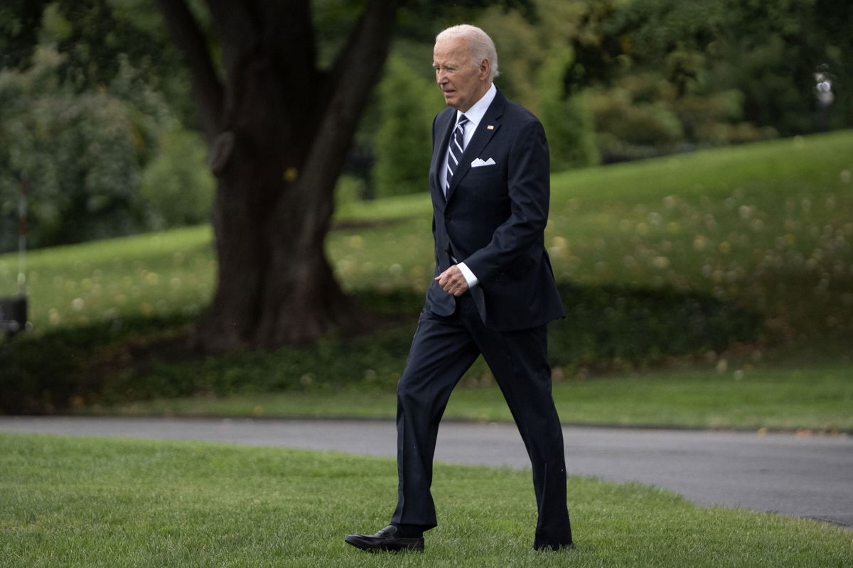 <i>Mark Schiefelbein/AP via CNN Newsource</i><br/>President Joe Biden walks out of the White House to board Marine One on the South Lawn in Washington