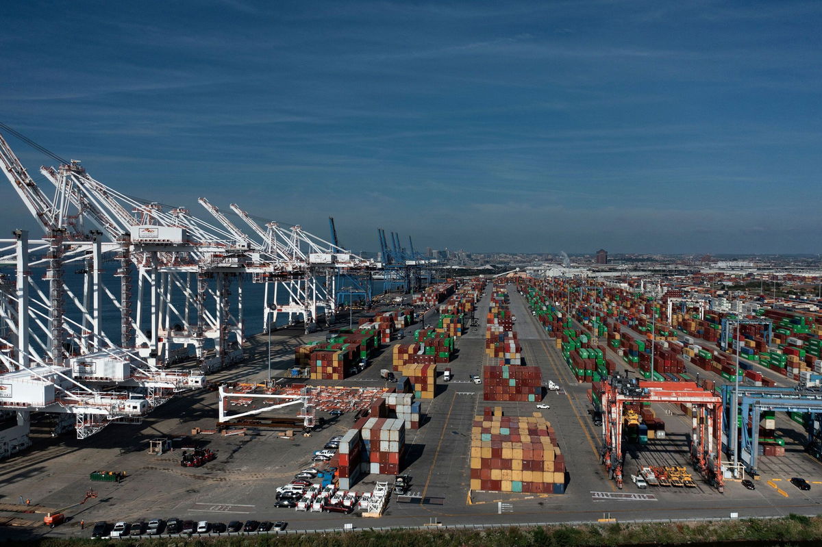 <i>Brendan Smialowski/AFP/Getty Images/File via CNN Newsource</i><br/>Cargo containers are readied for transport at the Port of Baltimore in Baltimore