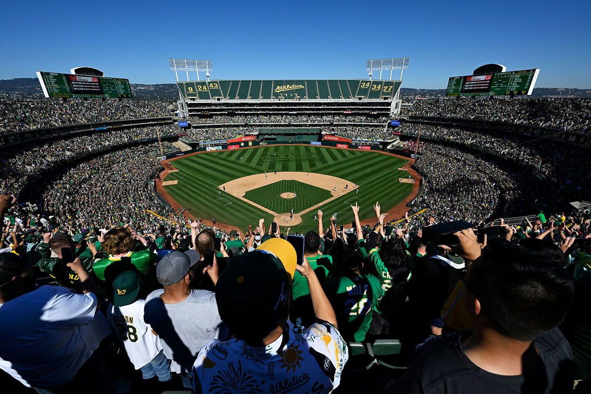 <i>Ezra Shaw/Getty Images via CNN Newsource</i><br/>Athletics reliever Mason Miller (No. 19) and teammates celebrate the final home win in Oakland.