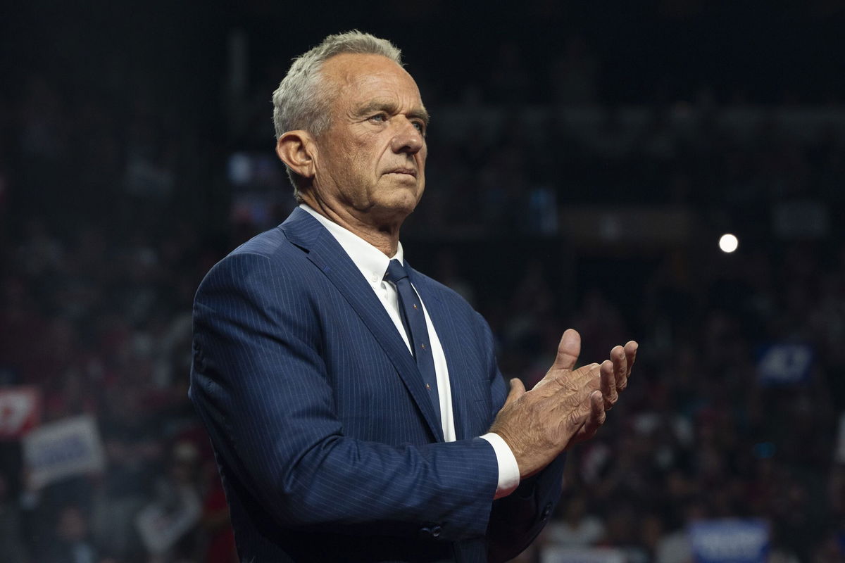 <i>Rebecca Noble/Getty Images via CNN Newsource</i><br/>Former Republican presidential candidate Robert F. Kennedy Jr. listens during a campaign rally for Republican presidential nominee