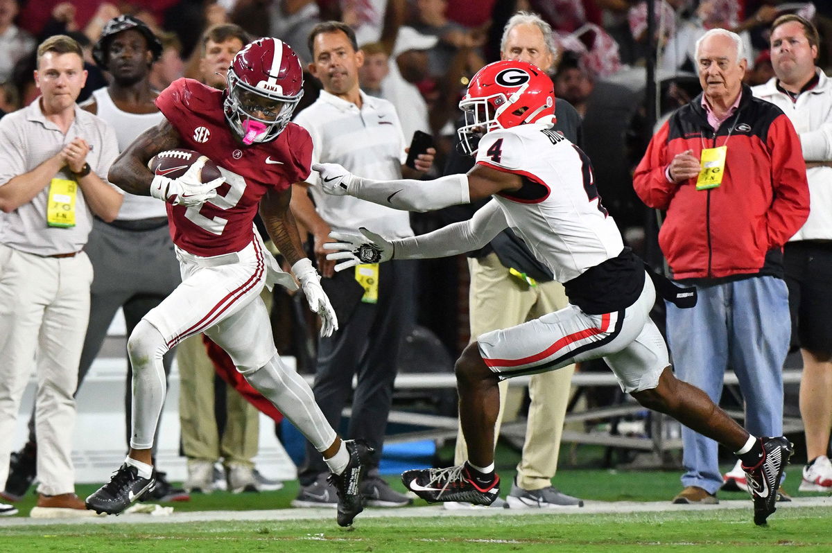 <i>Michael Thomas/AP via CNN Newsource</i><br/>Texas quarterback Arch Manning dives toward the goalline during the second half.