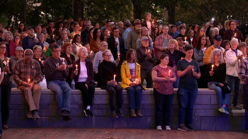 <i>WLOS via CNN Newsource</i><br/>A candlelight vigil was held at Pack Square Park in downtown Asheville on Tuesday