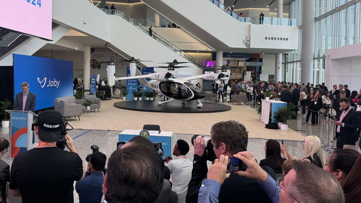 FAA Administrator Mike Whitaker announces new rules for electric vertical takeoff and landing aircraft at the National Business Aviation Association convention in Las Vegas.
