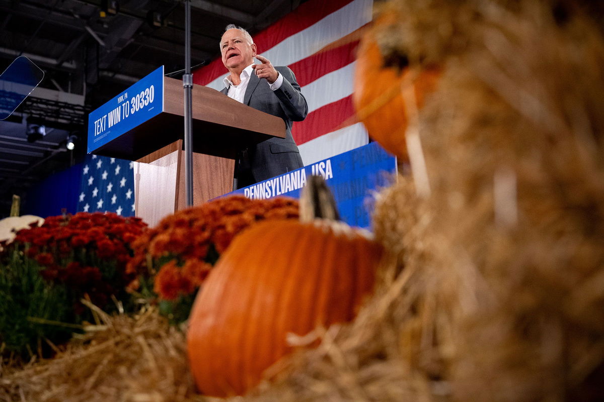 <i>Andrew Harnik/Getty Images via CNN Newsource</i><br/>Minnesota Gov. Tim Walz speaks at a rally at York Exposition Center UPMC Arena on October 2 in York