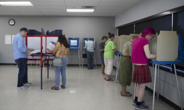 People arrive to cast their ballot during early voting in Minnesota on September 20.