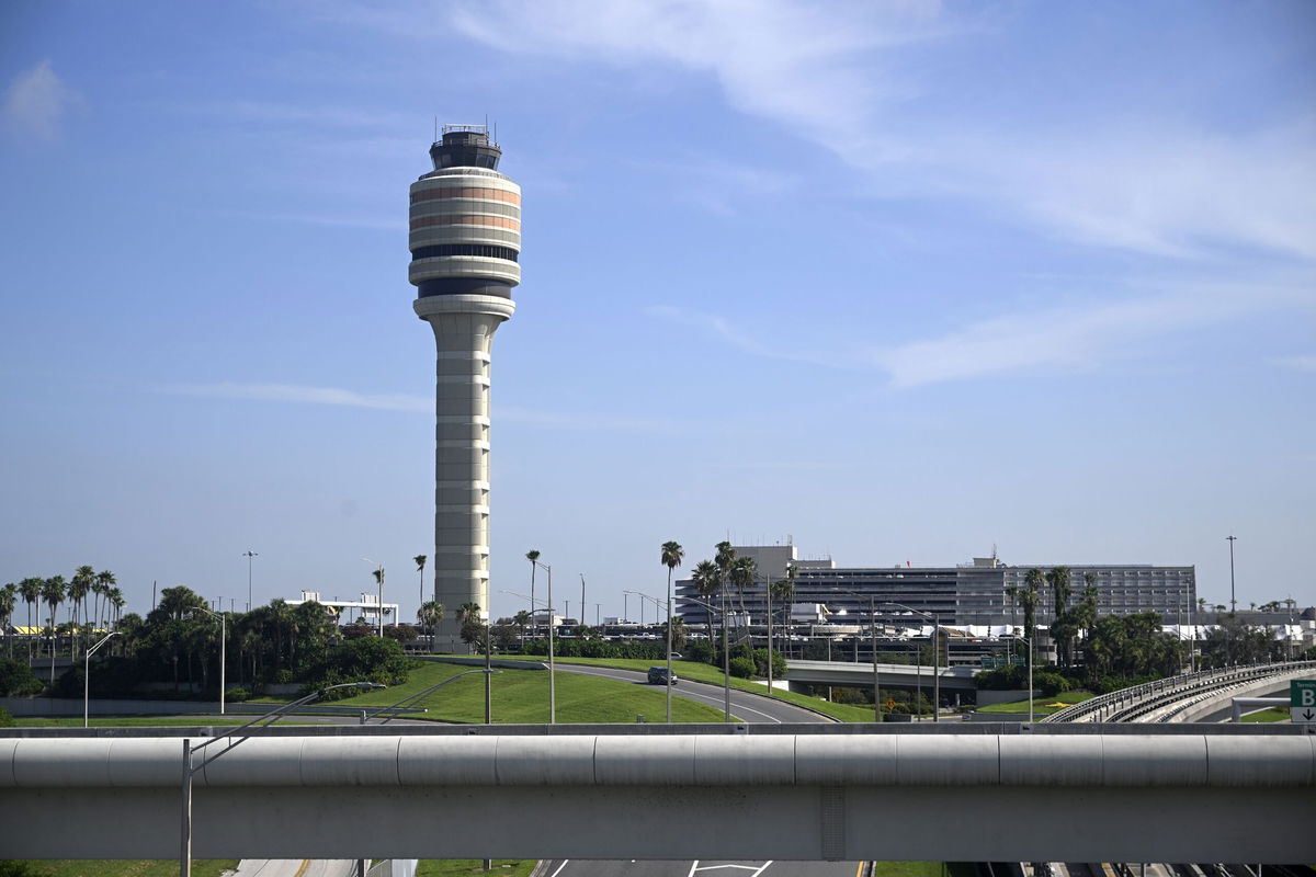 <i>Phelan M. Ebenhack/AP via CNN Newsource</i><br/>The FAA air traffic control tower is pictured at Orlando International Airport. The Federal Aviation Administration says that graduates of two college air traffic control programs can now bypass the agency’s backlogged training academy.