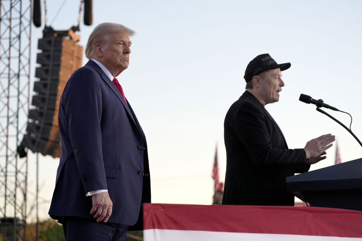 <i>Alex Brandon/AP via CNN Newsource</i><br/>Elon Musk speaks alongside former President Donald Trump at a campaign event on October 5 in Butler