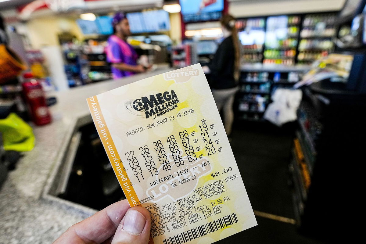 <i>Mike Stewart/AP via CNN Newsource</i><br/>A Mega Millions ticket will cost $5 next year.