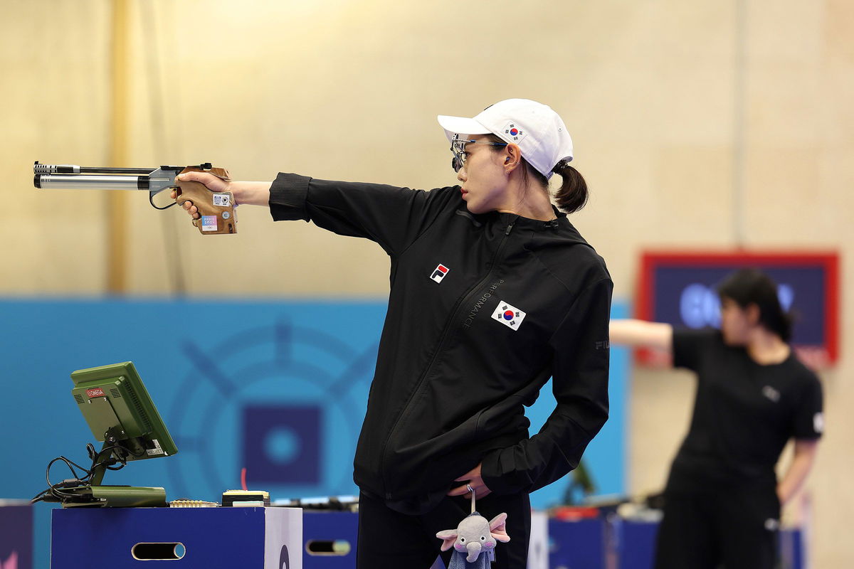 <i>Charles McQuillan/Getty Images/File via CNN Newsource</i><br/>Kim shoots during the women's 10-meter air pistol final at the Paris Olympics.