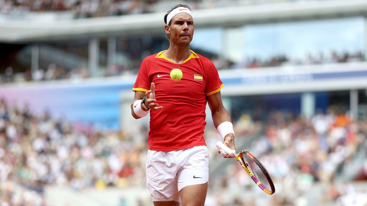 <i>Julian Finney/Getty Images via CNN Newsource</i><br/>Nadal celebrates winning Wimbledon in 2010.