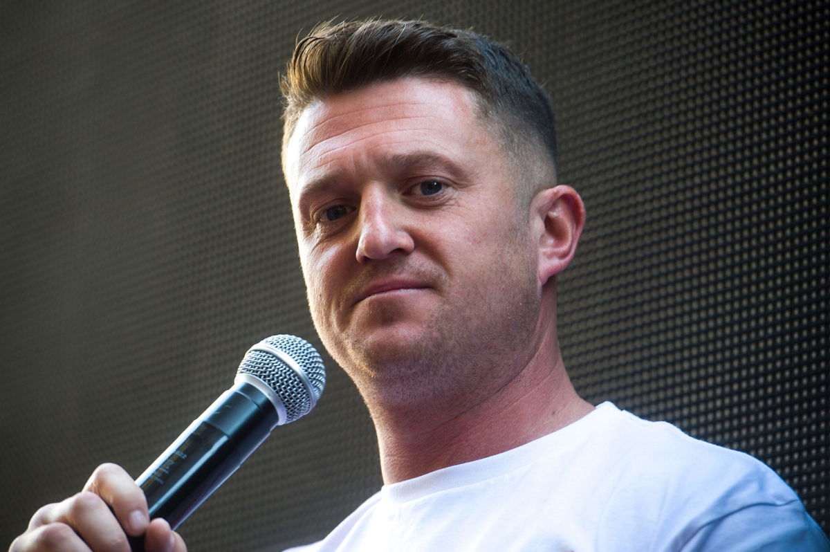 <i>Peter Summers/Getty Images via CNN Newsource</i><br/>British far-right activist Tommy Robinson (real name Stephen Yaxley-Lennon) is shown speaking to supporters in London in 2021. Robinson has been jailed for 18 months after he admitted to being in contempt of court by repeating false accusations about a Syrian refugee