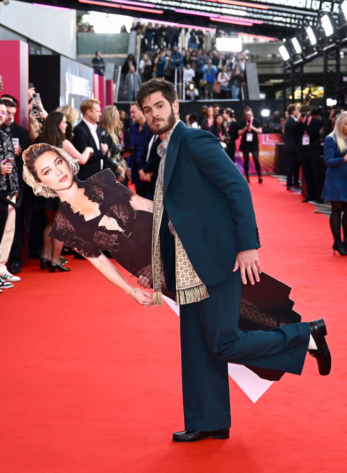 <i>Gareth Cattermole/Getty Images via CNN Newsource</i><br/>His custom Valentino outfit was somewhat overshadowed by his 5 foot 4 inch long cardboard cutout.