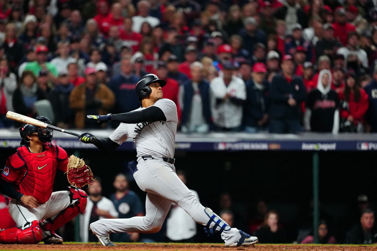 <i>Mary DeCicco/MLB/Getty Images via CNN Newsource</i><br/>Juan Soto #22 of the New York Yankees hits a three-run home run in the 10th inning during Game 5 of the ALCS.