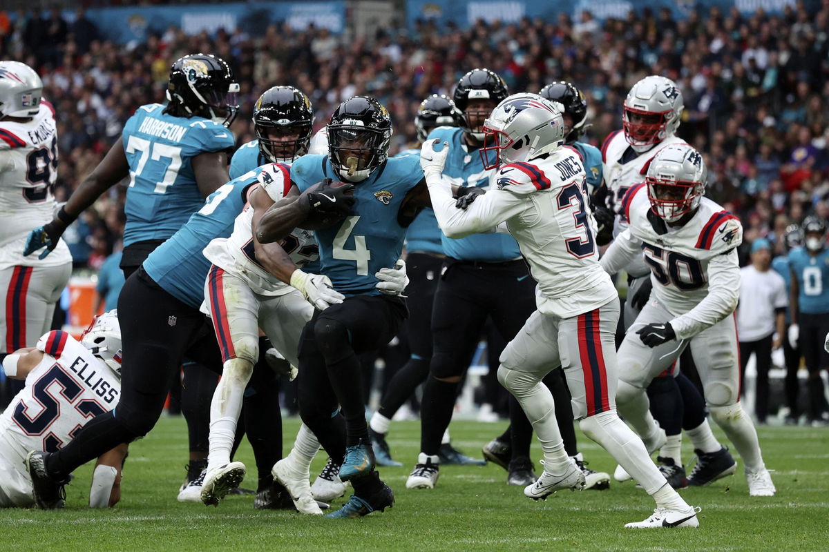 <i>Ian Walton/AP via CNN Newsource</i><br />Jacksonville Jaguars running back Tank Bigsby rushes for his first touchdown against the New England Patriots.