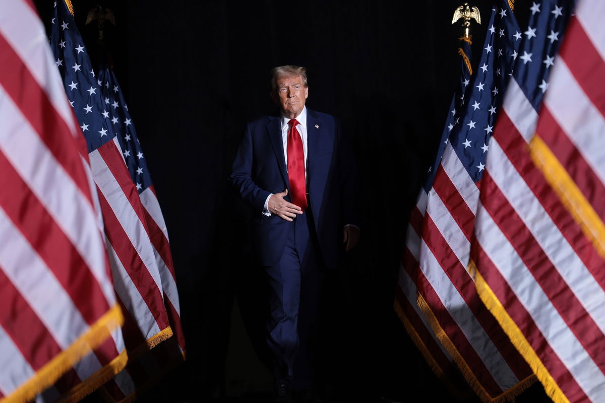 <i>Win McNamee/Getty Images via CNN Newsource</i><br/>Former President Donald Trump arrives at a campaign rally on October 18 in Detroit