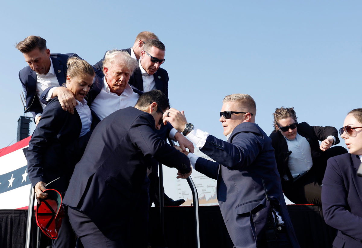 <i>Anna Moneymaker/Getty Images via CNN Newsource</i><br/>Former President Donald Trump is rushed offstage during a rally on July 13 in Butler