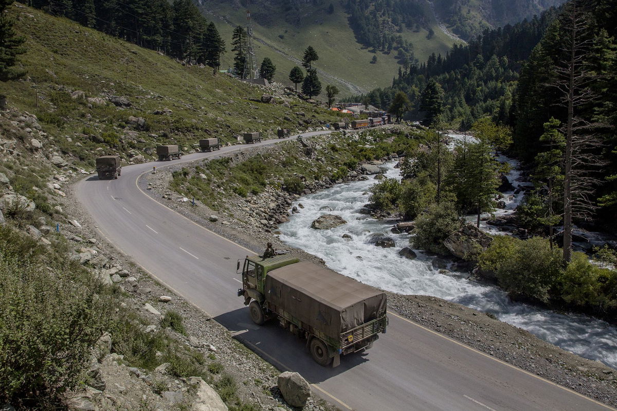 <i>Yawar Nazir/Getty Images via CNN Newsource</i><br/>An Indian army convoy drives towards Leh