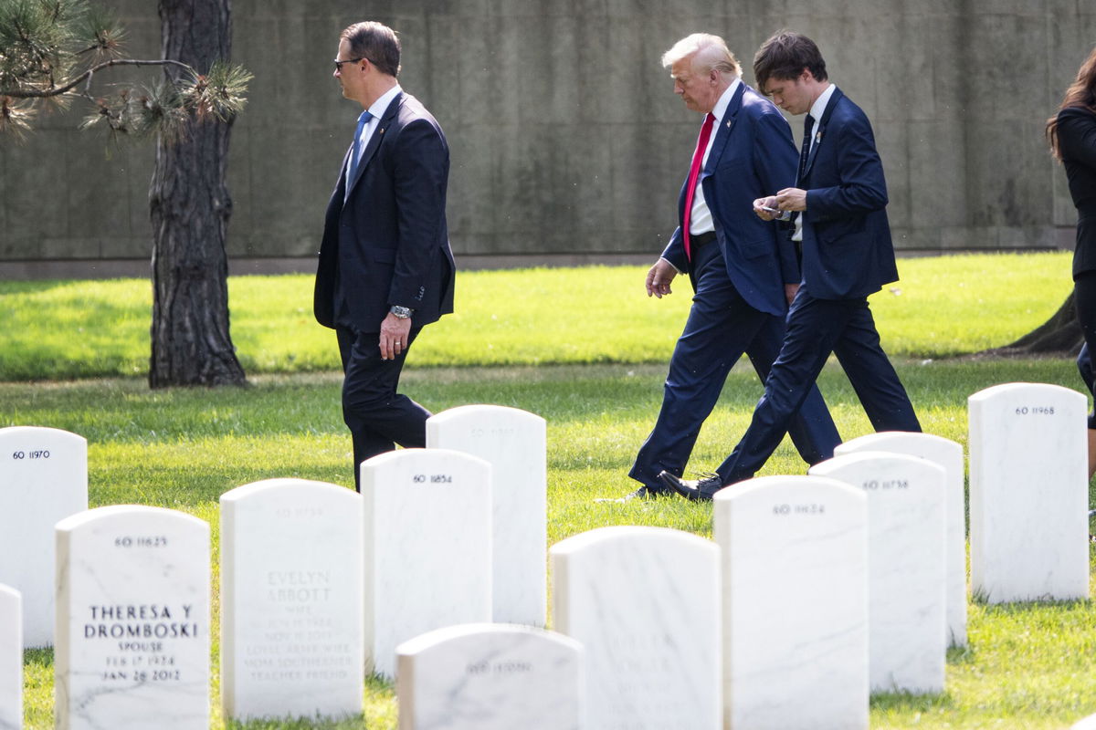 Republican presidential nominee former President Donald Trump leaves Arlington National Cemetery after he attended a ceremony honoring the lives of those who died at the Abbey Gate Bombing, on August 26, in Arlington, Virginia.