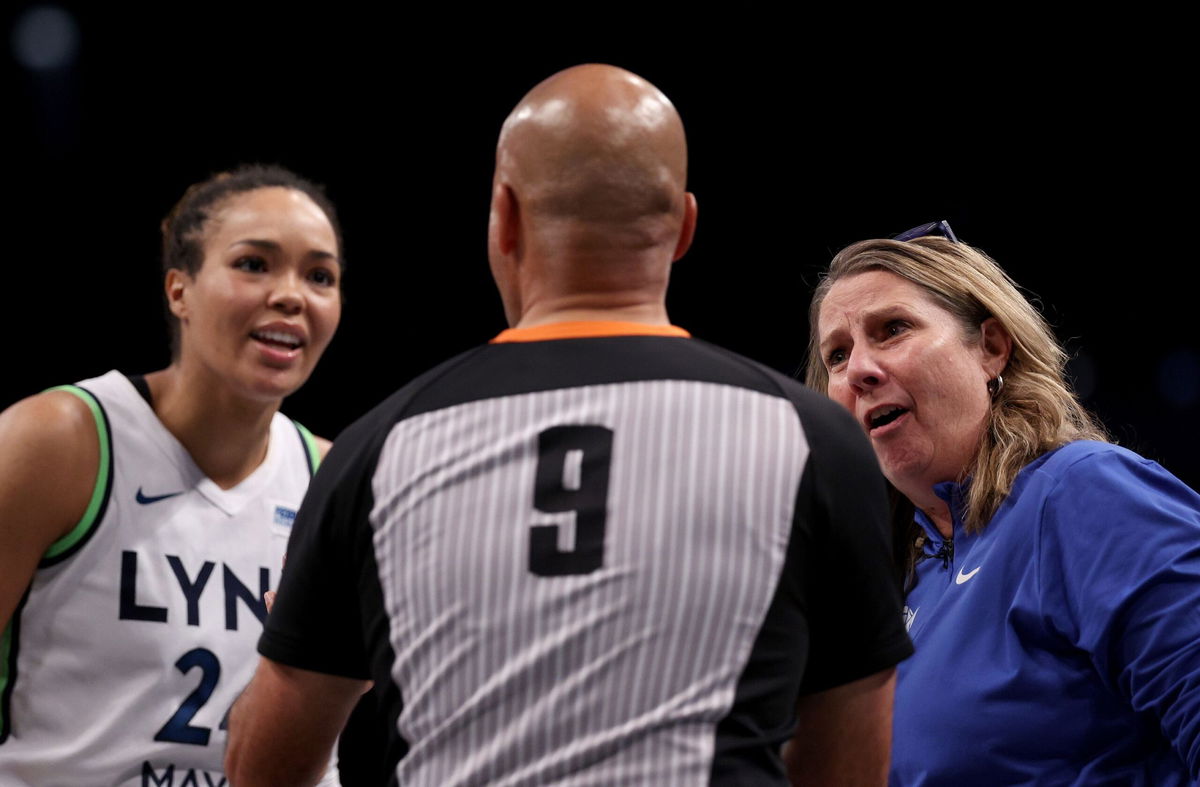 <i>Elsa/Getty Images via CNN Newsource</i><br/>Minnesota Lynx forward Napheesa Collier and head coach Cheryl Reeve discuss a foul call with a game official in the fourth quarter of Game Five of the WNBA Finals.