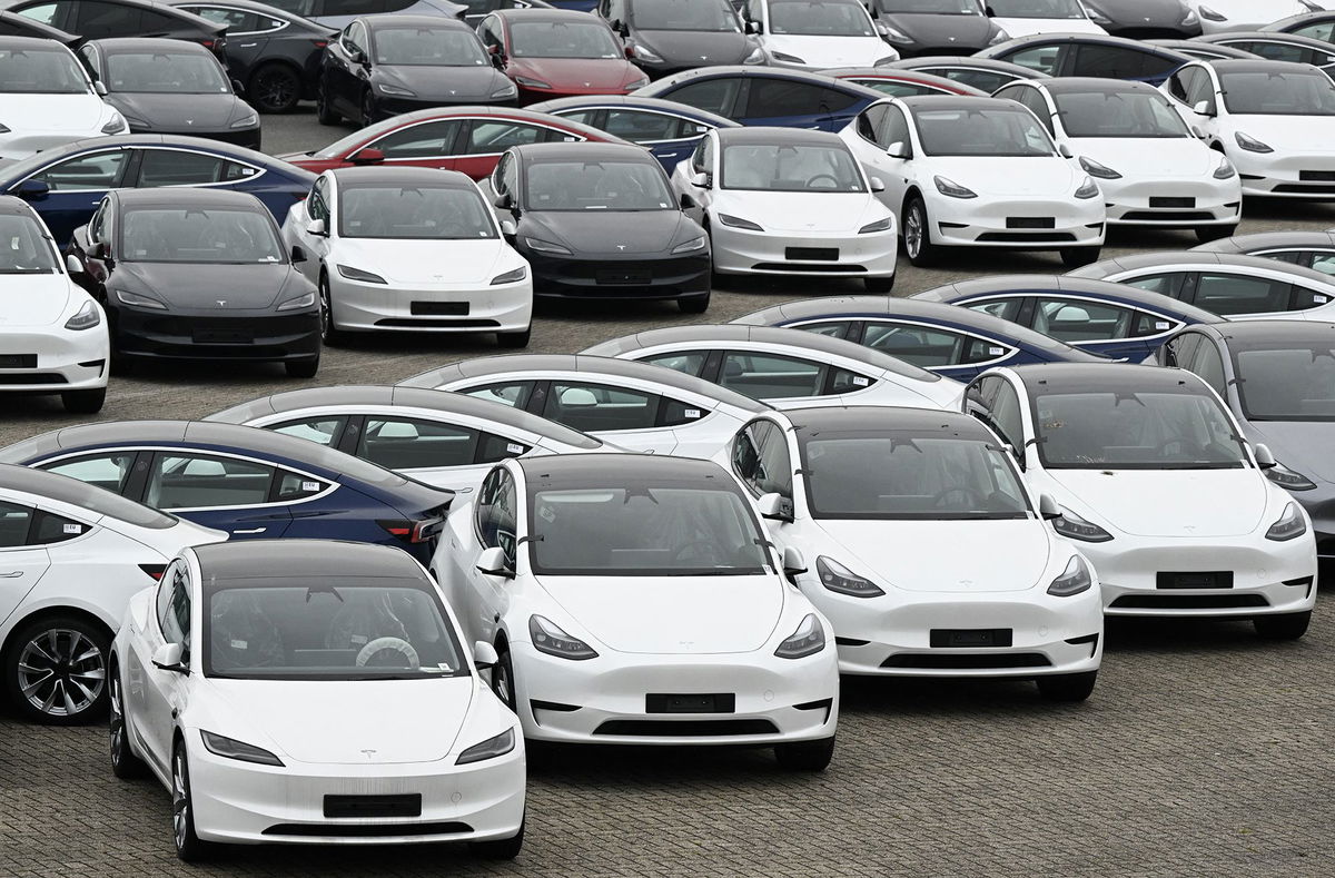 <i>John Thys/AFP/Getty Images via CNN Newsource</i><br/>Teslas stationed in a storage area in the Zeebrugge port