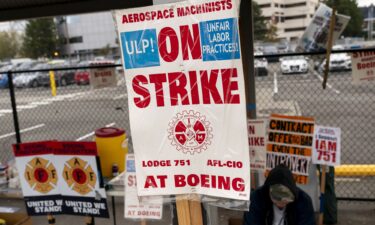 Boeing workers gather on a picket line during an ongoing strike on October 24 in Seattle.