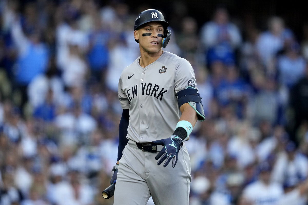 <i>Ashley Landis/AP via CNN Newsource</i><br/>Shohei Ohtani is helped off the field after getting hurt during the seventh inning in Game 2 of the World Series against the New York Yankees.